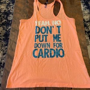 Orange racer back tank top with glitter lettering workout tank